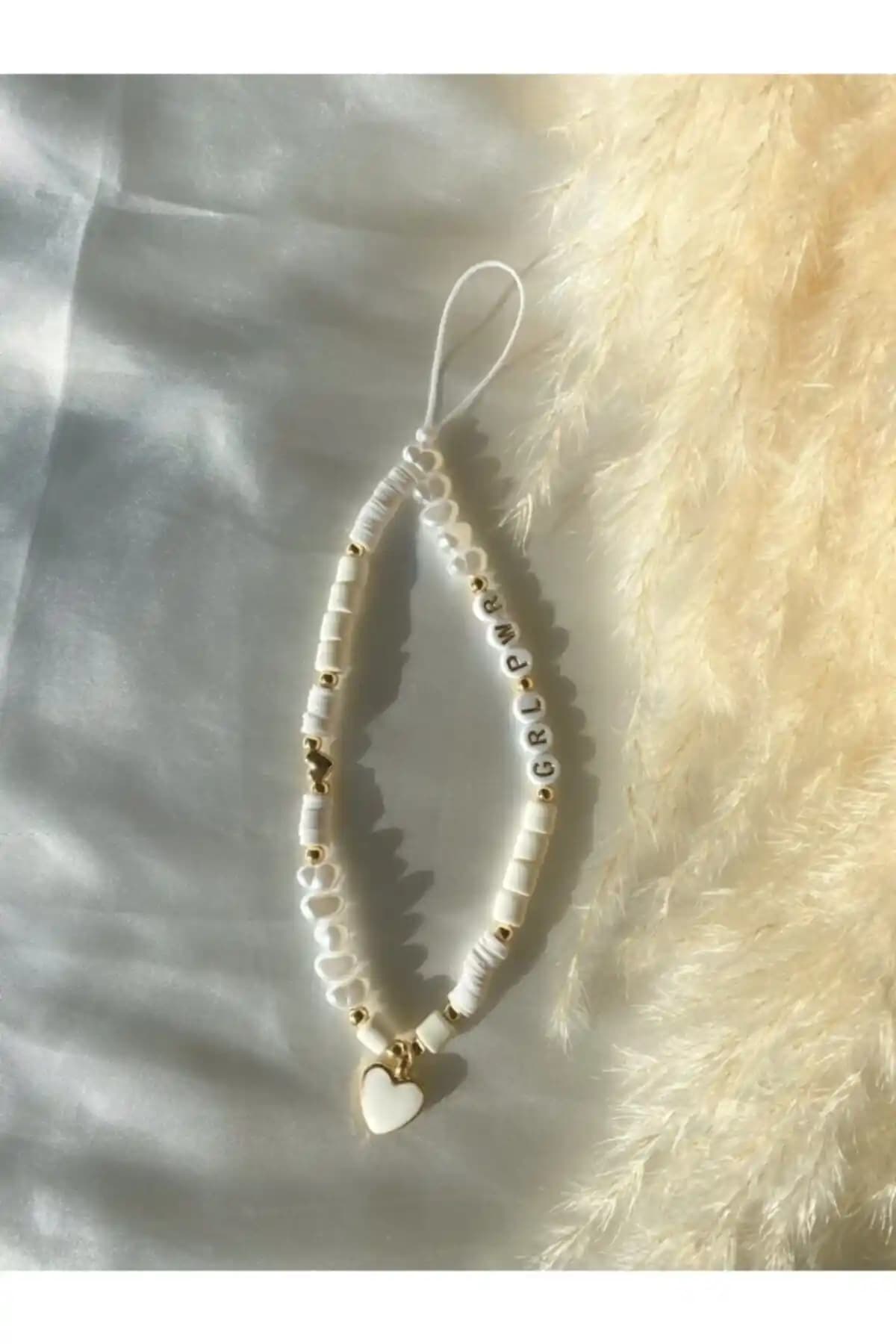 Moshi Design Kız Gücü Telefon Askısı: Şık ve Dayanıklı Telefon Aksesuarı